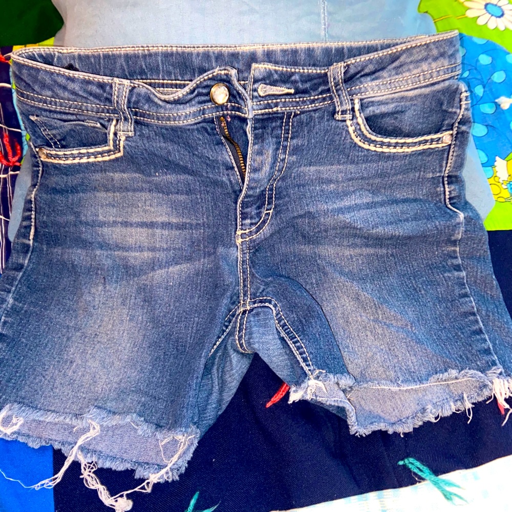 Dark blue faded glory shorts .